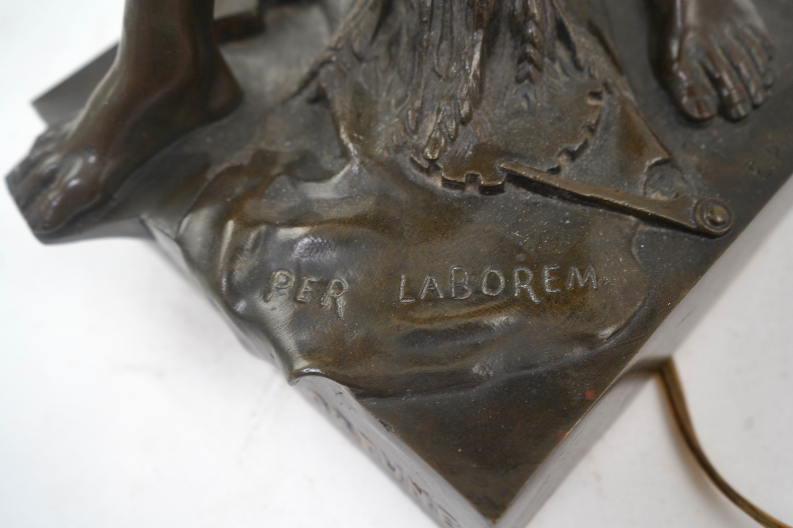 After Émile Louis Picault, a large bronze figural lamp